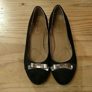 Black dress shoes with silver bows, size 5.